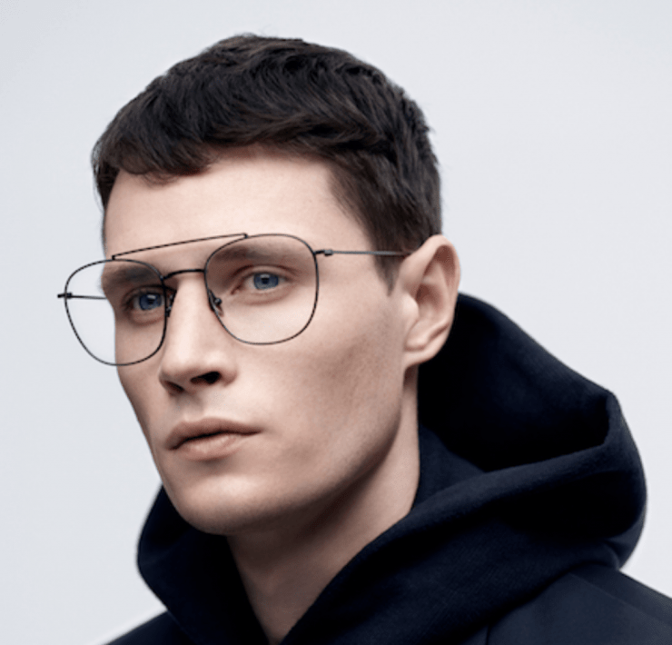 Model wearing Komono glasses