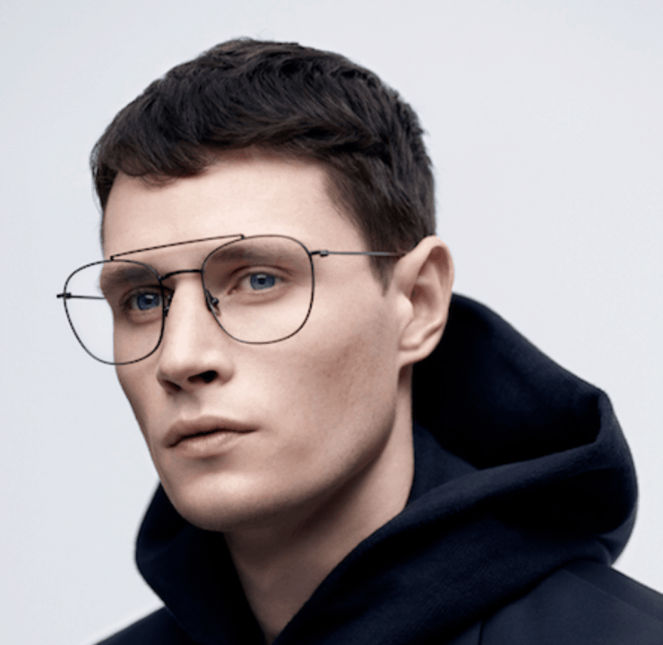 Model wearing Komono glasses