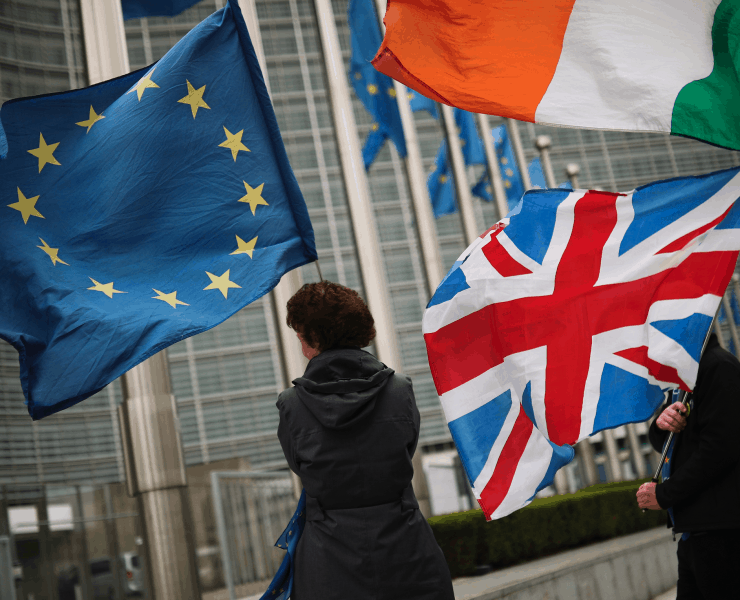 Protesters waving Brit & EU flags in Brussels