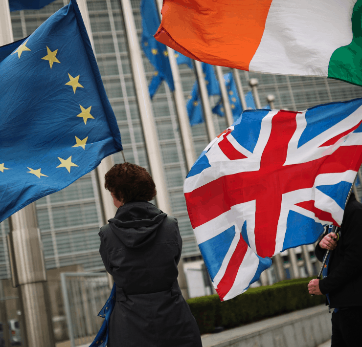 Protesters waving Brit & EU flags in Brussels