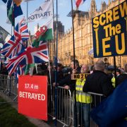 Protesters outside Westminster unhappy about the delay to Brexit
