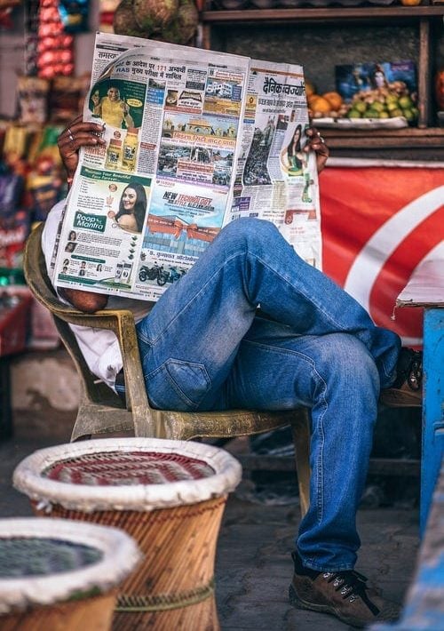 A man reading a newspaper