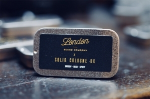 A tin of wax cologne 